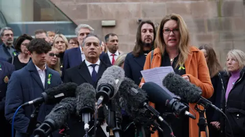PA Media The bereaved families of the Nottingham attacks outside Nottingham Crown Court the day Calocane was sentenced.