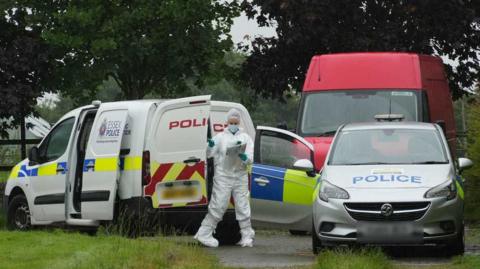 Forensic officer outside the home