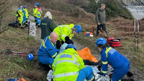St Austell Coastguard The St Austell Coastguard team rescuing Professor Lavy in South Cornwall.