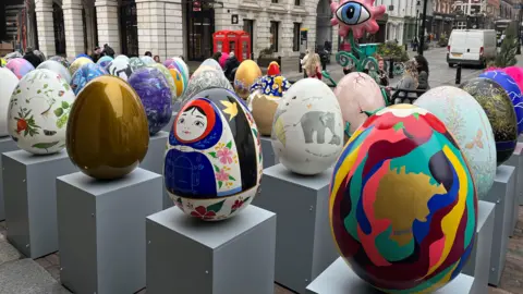 Dozens of large, decorated eggs, including one like like a Russian doll and another with an elephant