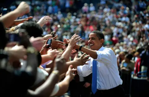 Getty Images Barack Obama greets voters at a rally during 2008 presidential campaign