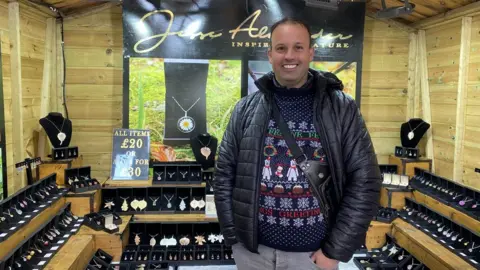 James Gregg in front of his stall