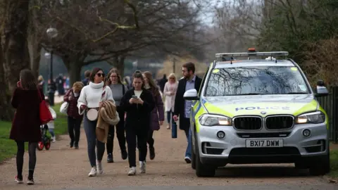 Getty Images People walk in Hyde Park, London