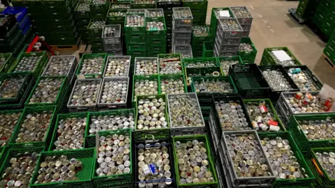 BBC Arial shot of lots of boxes of food at Trussell Trust food bank in Cardiff