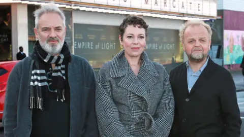 Getty Images Sam Mendes, Olivia Colman and Toby Jones attend the South Coast Gala Screening of "Empire Of Light" at Dreamland on January 8, 2023 in Margate, England.