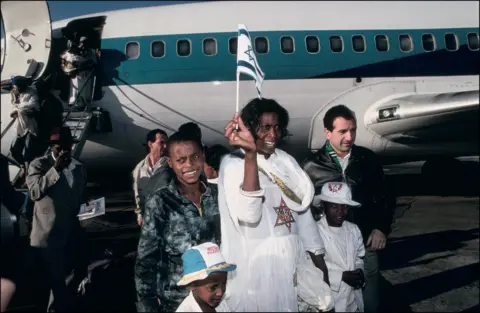 Getty Images Ethiopian Jews arrive at Ben Gurion airport in Tel Aviv, Israel on December 01, 1990