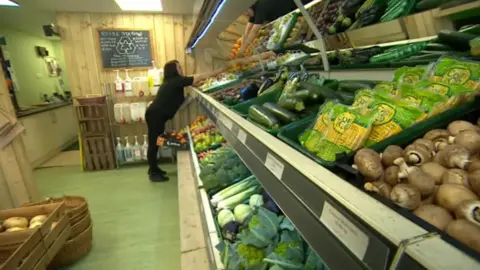 Cliana Bolan in her fruit and veg shop