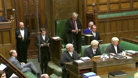 House of Commons speaker John Bercow surrounded by clerks wearing their wigs