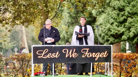 Parade chairman Ken Whitehouse was joined by Rev Dave Poultney, rector of All Saints, Bedworth