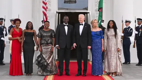 Getty Images US President Joe Biden, First Lady Jill Biden, President William Ruto, First Lady Rachel Ruto of Kenya and their daughters arrive for a State Dinner at the White House in Washington, DC, on May 23, 2024