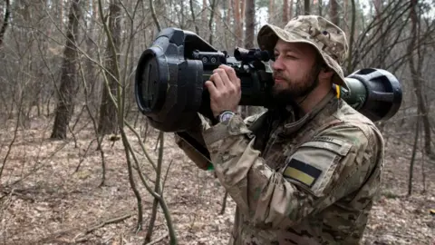 Getty Images Oleg demonstrates firing the MBT-NLAW (Next generation Light Anti-tank Weapon) provided by the United Kingdom