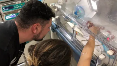 Caters Chloe Wilkinson, Patraic Walsh-Kavanagh and their baby Lorcan