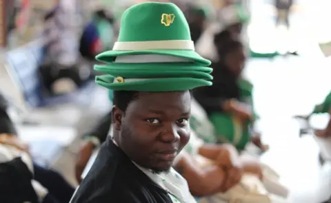 Reuters A Nigerian fan waits for a flight at Sheremetyevo International Airport in Moscow, Russia, June 17, 2018