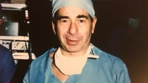 Calne family Sir Roy Calne wearing scrubs