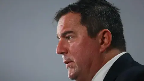 DA leader John Steenhuisen is seen looking ahead during an event