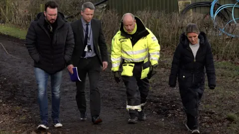 PA Media Paul Ansell, (left) with Peter Faulding (2nd from right)