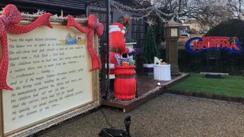 A festive scene carved out of polystyrene in a front garden in Essex.