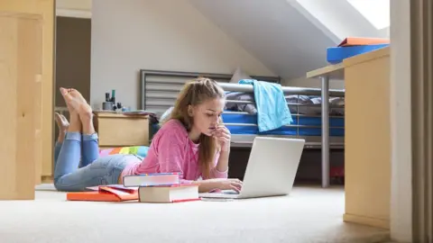 Getty Images Student in room (posed by model)