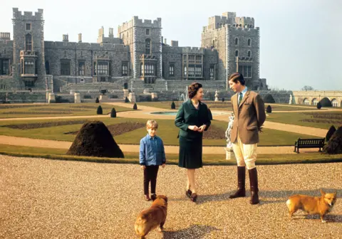 Getty Images Prince Charles with The Queen - and Prince Edward and corgis - at Windsor Castle in 1969