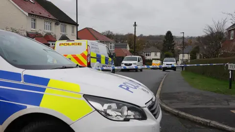 Police vehicles at the scene