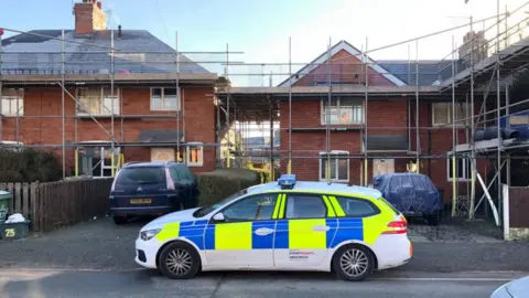 BBC the street in Ruabon where the body was found in a house fire