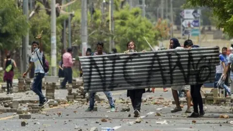 EPA Demonstrators at the National University of Engineering (UNI) clash with anti-riot police over pension reforms 20 April 2018