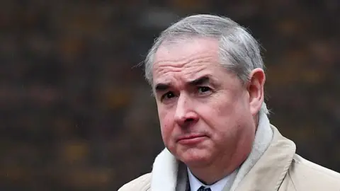 Sir Geoffrey Cox