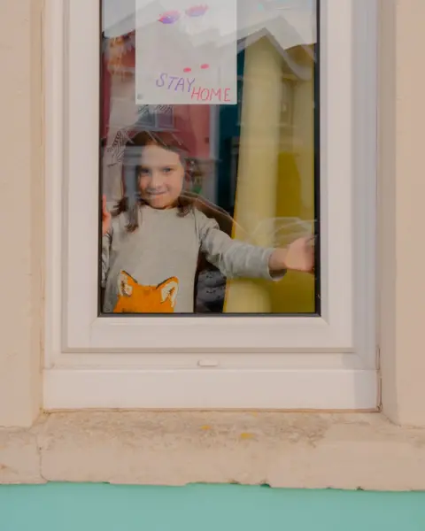 Tom Skipp Freida at the window