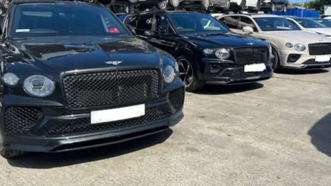 Essex Police Photo of stolen cars found in containers at a port