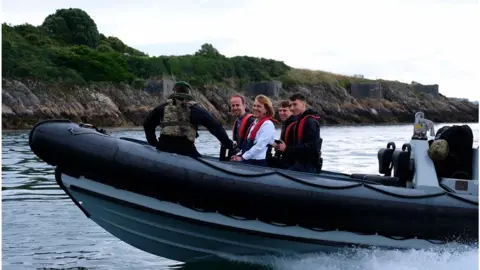 Diocese of Exeter Bishop of Plymouth on landing craft