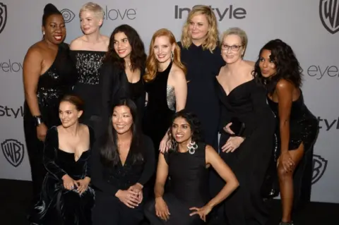 AFP/Getty Images Meryl Streep and Emma Watson are among eight actresses to bring gender and racial justice activists as their guests to the Golden Globes, including MeToo founder Tarana Burke.