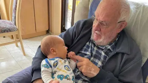 Australian Red Cross Lifeblood James Harrison with his grandson, Trey, in an earlier picture