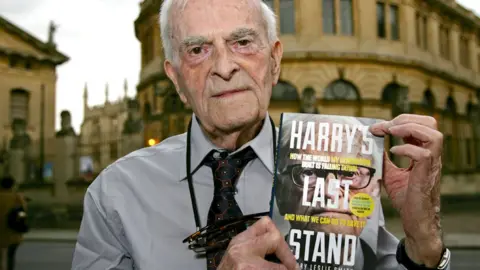 Shutterstock Harry Leslie Smith with his book Harry's Last Stand