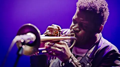 Getty Images Keyon Harrold plays the trumpet