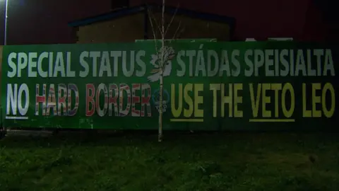 BBC The bilingual mural unveiled by Sinn Féin in west Belfast on Wednesday night