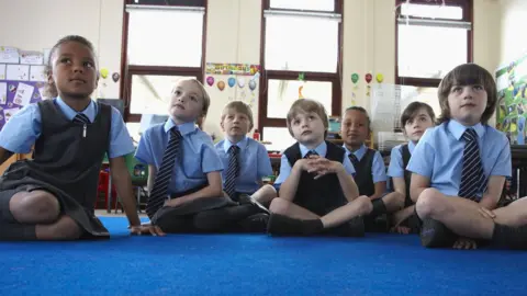 Gary John Norman/Getty Images Primary school children