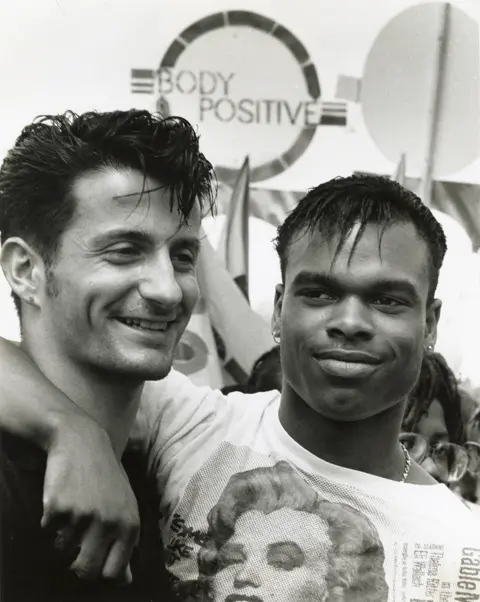 Gordon Rainsford Archive, Bishopsgate Institute Two men attend a Pride march in 1988