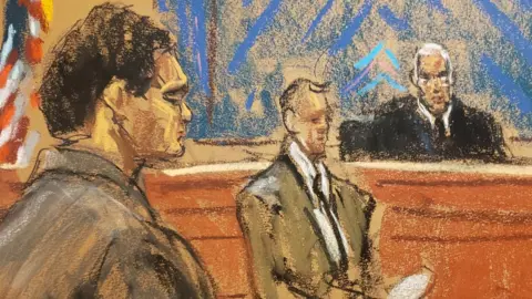 Reuters FTX founder Sam Bankman-Fried stands as the jury foreperson reads the verdict in his fraud trial over the collapse of the bankrupt cryptocurrency exchange at federal court in New York City, US, 2 November, 2023, in this courtroom sketch.