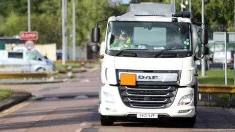 Anadolu Agency Fuel truck leaves Buncefield storage depot