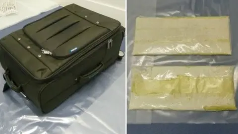 Police handout Suitcase and cocaine