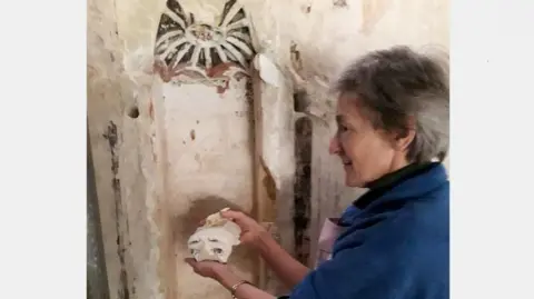 St Mary's Church Conservator with head of statue