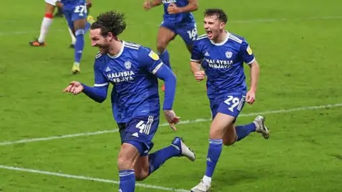 Sean Morrison celebrates scoring the winning goal