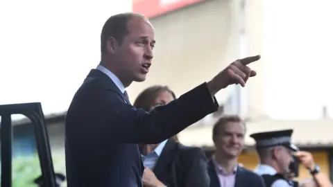 Reuters Prince William pointing