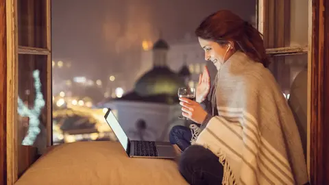 Getty Images Woman on a virtual date