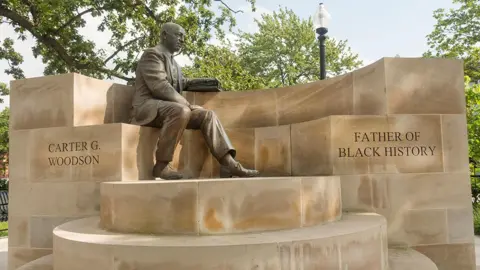 Alamy The Carter G Woodson memorial park statue Washington DC