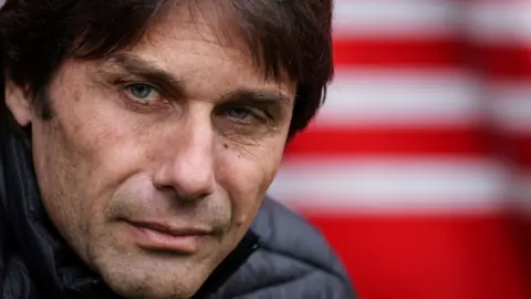 Tottenham manager Antonio Conte in the dugout