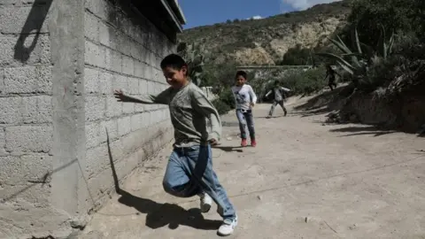 Reuters Children run home to follow a televised class as millions of students returned to classes virtually after schools were ordered into lockdown in March, due to the coronavirus disease (COVID-19) outbreak, in Chilcuautla, Hildalgo state, Mexico August 24, 2020.