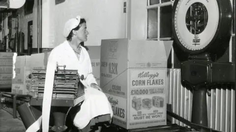 Kellanova  Woman working at the Kellogg's factory at Trafford Park