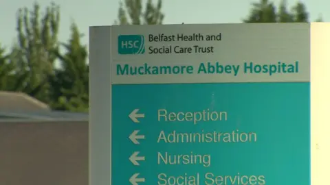 A sign that reads: Muckamore Abbey Hospital