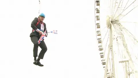 PA Media Boris Johnson on a zip wire